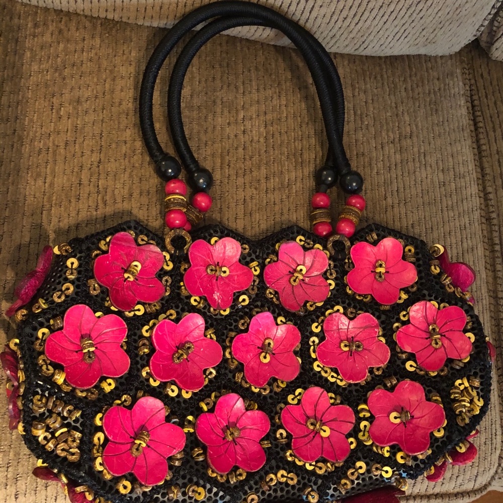 Pink bag with wood beads